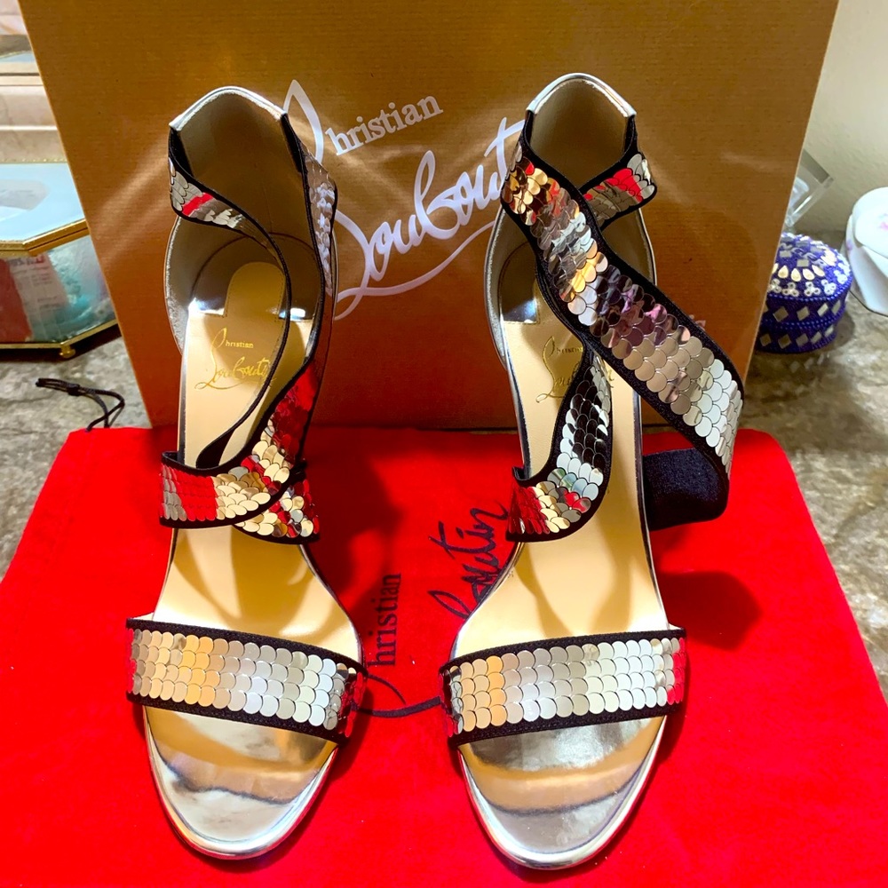 Christian Louboutin  new never worn